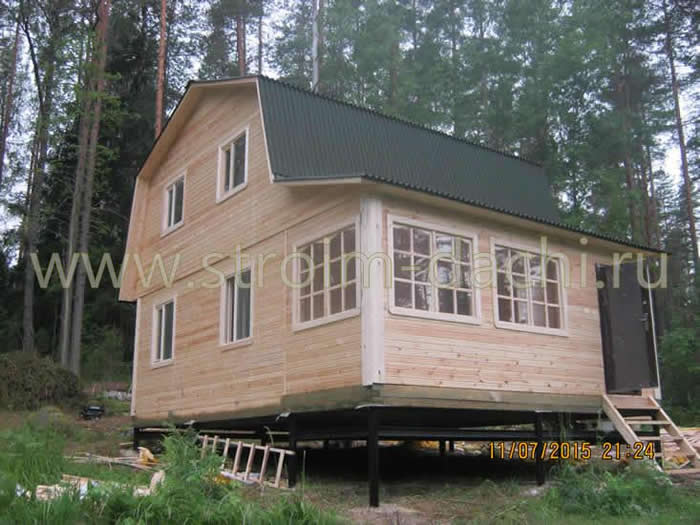 Пристройка к деревянному дому: особенности строительства и отделки